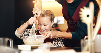 Buy stock photo Mom, girl and baking at Christmas with learning, whisk and support for festive holiday in home. People, mother and daughter in kitchen, happy and mixing ingredients for xmas cookies in family house