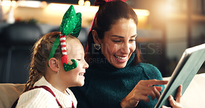 Buy stock photo Christmas, happy mother and kid with tablet for holiday movie, game or gift shopping in house. Xmas, parent and child with tech in living room for festive show, learning or family scroll online store