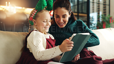 Buy stock photo Christmas, happy mother and kid with tablet in family home for holiday movie, game and gift shopping. Xmas, parent and child with tech in living room for festive show, education and online purchase