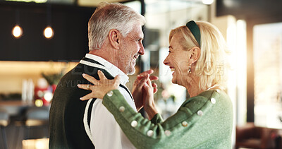 Buy stock photo Happy, senior couple and dancing on Christmas for love, romance or season in home. Holding hands, marriage and elderly people with smile in lounge for festive holiday, relationship or bonding