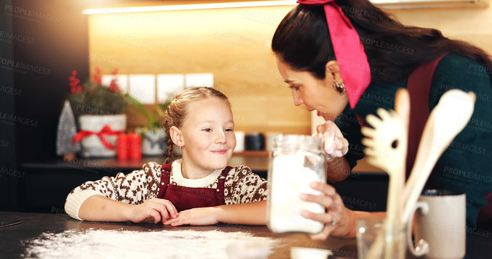 Buy stock photo Mom, girl and cooking with flour at Christmas with smile, teaching and ingredients for cookies in home. People, mother and daughter in kitchen, learning or bonding with baking at xmas in family house
