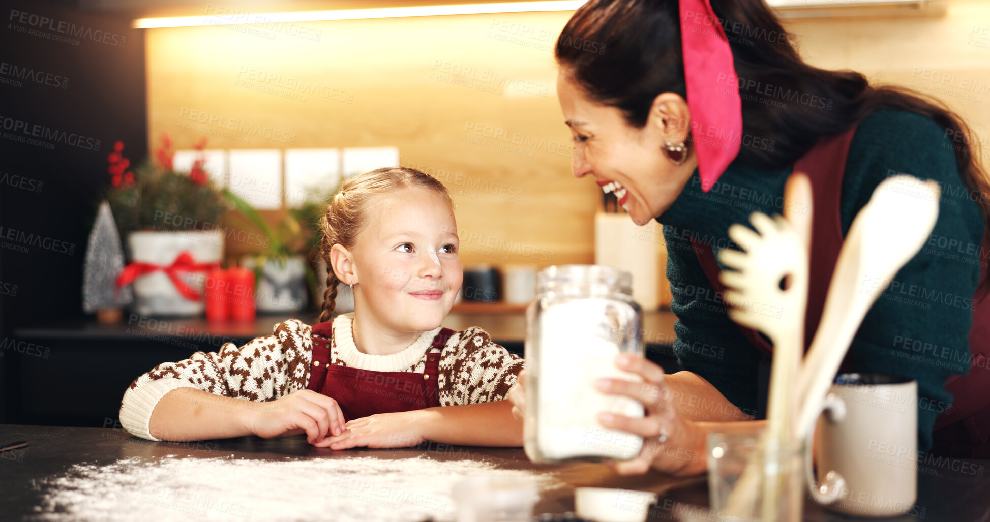 Buy stock photo Christmas, baking or flour with mother and daughter in kitchen for December holiday season. Celebration, having fun and smile of girl child with happy single parent in home for festive cooking