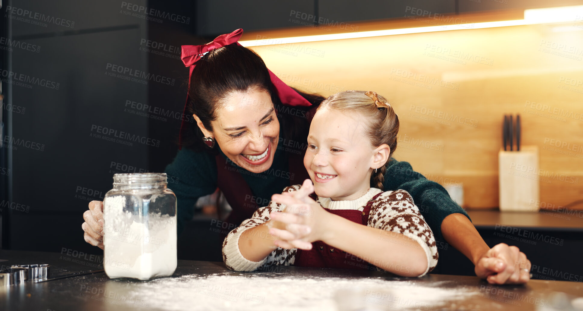 Buy stock photo Play, happy mother and kid baking for learning, love and bonding in home kitchen. Parent, child and cooking with flour, help and teaching recipe to girl for dessert with family together at night