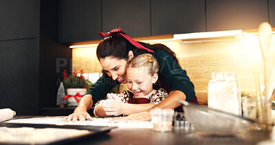 Buy stock photo Christmas, mother and child baking for learning, love and clapping in home kitchen. Happy parent, kid and cooking with flour, play and teaching recipe to girl for dessert on xmas holiday with family