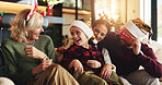 Family, generations and child on sofa for Christmas, festive season and bonding on holiday. Happy, home and girl with mom, dad and grandparents laugh on sofa for tradition, celebration and xmas