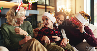 Buy stock photo Family, generations and child on sofa for Christmas, festive season and bonding on holiday. Happy, home and girl with mom, dad and grandmother laugh for tradition, celebration and xmas decoration