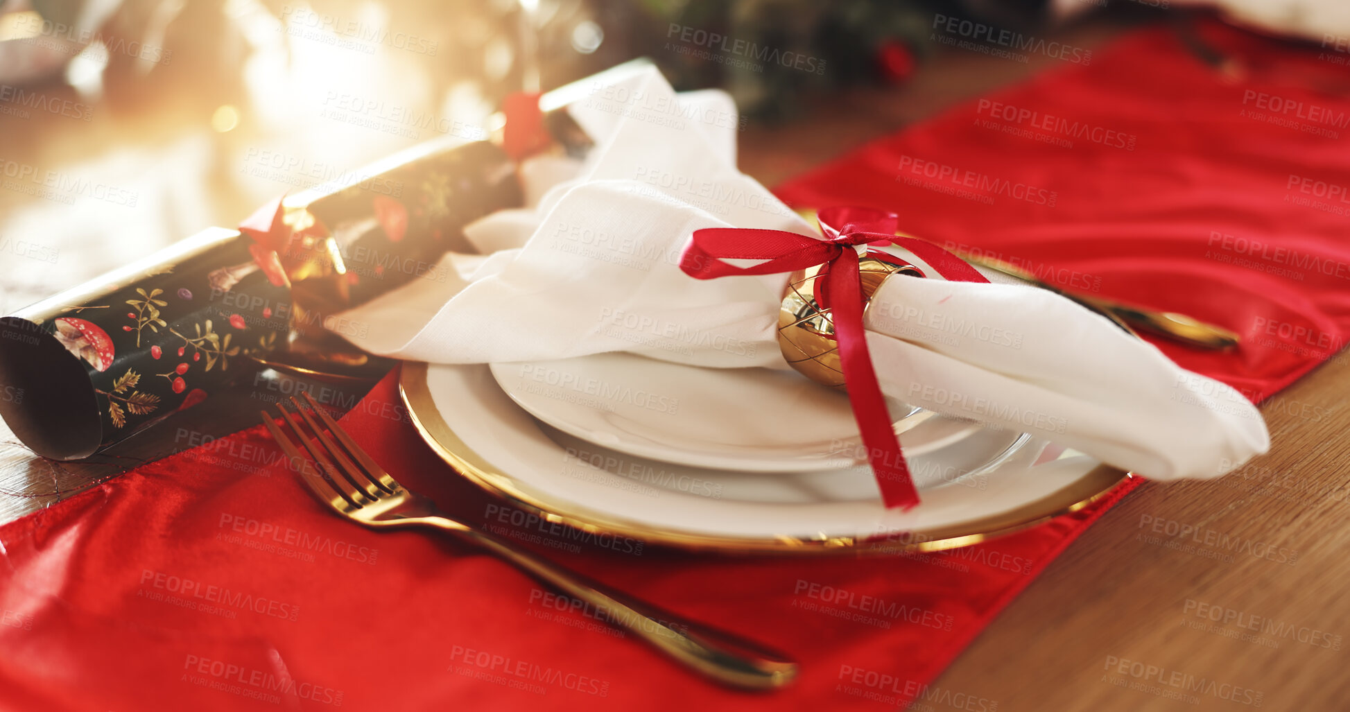 Buy stock photo Christmas, decorations and plate with napkin on table in dining room for festive celebration, event or lunch. Holidays, place setting and thanksgiving with social gathering in December in home.