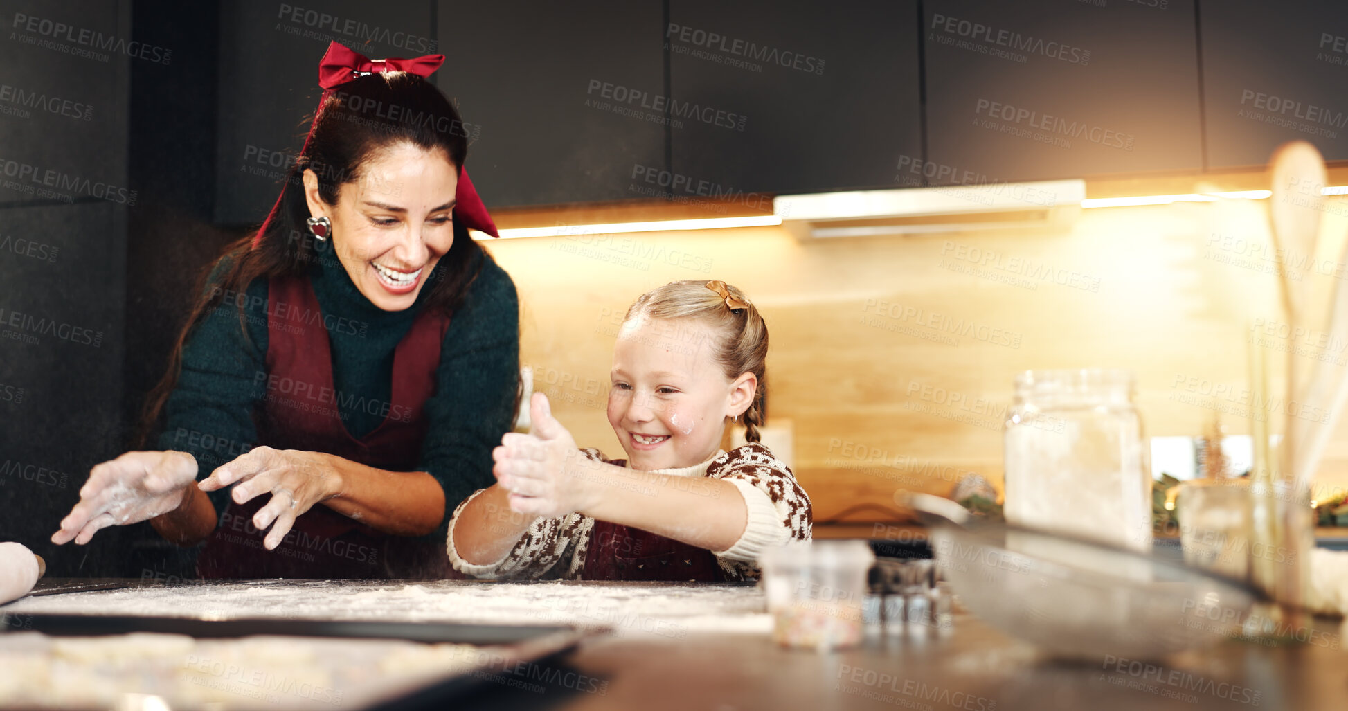 Buy stock photo Christmas, baking and smile of mother with daughter in kitchen of home for bonding or celebration. Flour, ingredients or recipe with happy parent and girl child in apartment for festive cooking