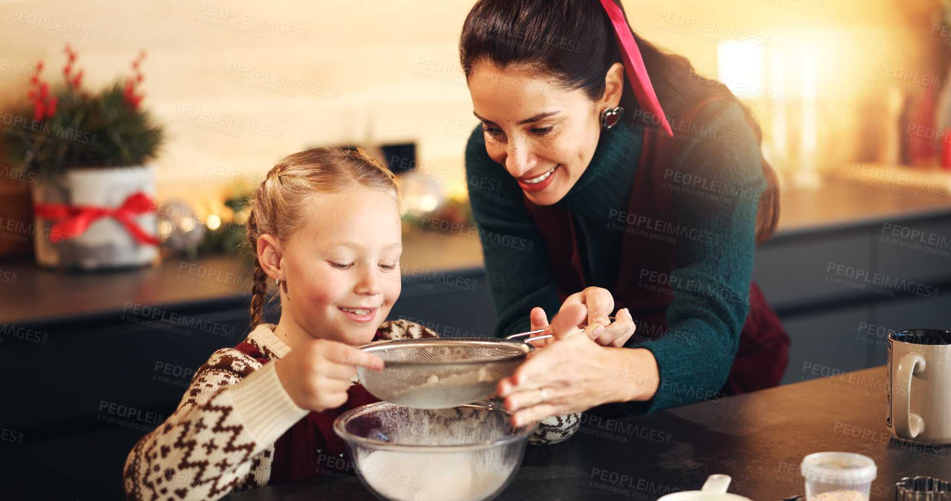 Buy stock photo Mom, girl and flour with sifting at Christmas with cooking, teaching and ingredients for cookies in home. People, mother and daughter in kitchen, learning and sieve for baking at xmas in family house