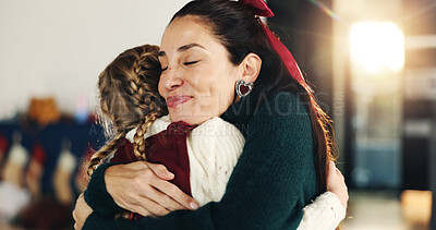 Buy stock photo Christmas, happy or hug with mother and daughter in living room of home for celebration together. December, festive or winter with smile of single parent and girl child embracing in apartment for joy
