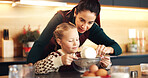 Baking, love and mother in kitchen, girl and bonding together with ingredients, bowl and learning. Child development, home and mama with daughter, parent and family with growth, teaching or meal prep