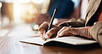 Business person, hands and writing with book for reminder, schedule or taking notes in office. Closeup, employee or event planner with pen, notebook or diary for ideas, agenda or tasks in workplace