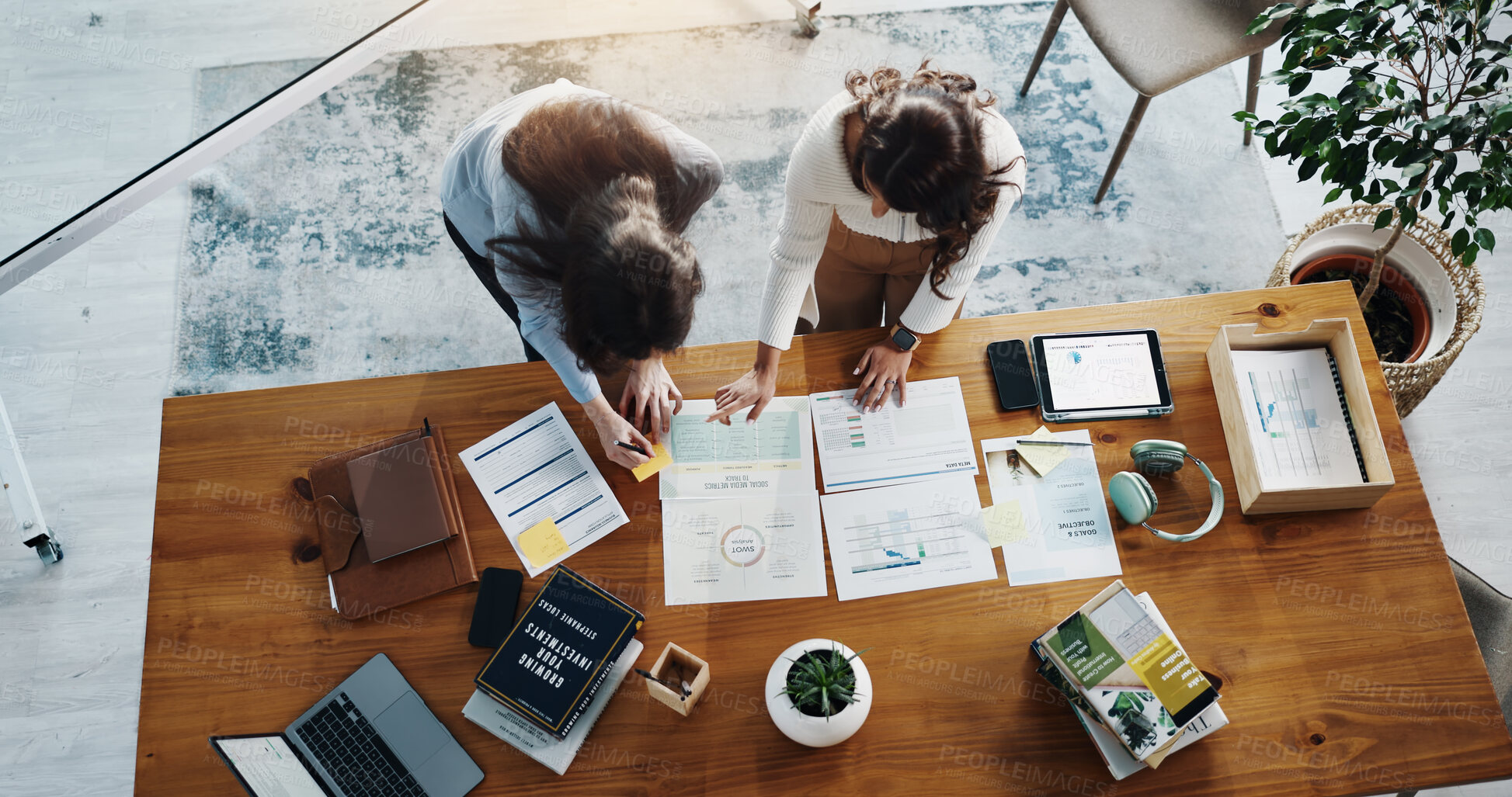 Buy stock photo Documents, technology and business women in office with planning for investment growth with teamwork. Paperwork, discussion and female financial advisors with statistics for profit report from above.