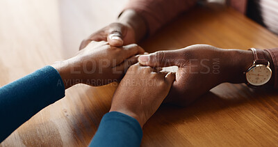 Buy stock photo Empathy, holding hands and solidarity with people in home together for bonding, confession or love. Help, hope and support with friends at table in apartment for patience, sympathy or understanding