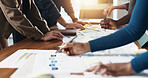 Documents, hands and planning with business people in office boardroom for collaboration or meeting. Infographic, marketing and strategy with employee group at work for chart, data or graph review