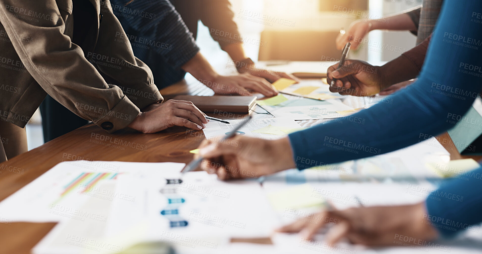 Buy stock photo Documents, hands and planning with business people in office boardroom for collaboration or meeting. Infographic, marketing and strategy with employee group at work for chart, data or graph review