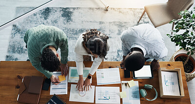 Buy stock photo Documents, technology and business people in office with planning for investment growth with teamwork. Paperwork, discussion and financial advisors with statistics for profit report from above.