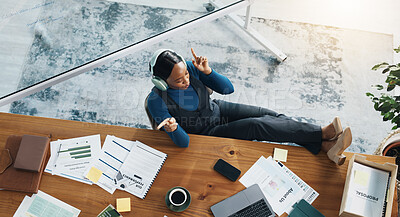 Buy stock photo Headphones, documents and black woman relax in office with music, radio or album online. Top view, paperwork and African financial advisor listening to playlist with audio tech for break in workplace