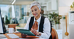 Business, mature woman and tablet in office for editor feedback, information and article post. Female journalist, digital and proofreading of latest news, update draft and review story of publication
