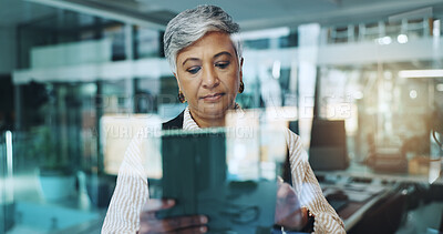 Buy stock photo Research, window and tablet with business woman in office for reading, client assessment and portfolio report. Project timeline, account review and planning with mature person for online update