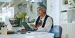 Creative, mature woman and tablet in office for editor feedback, information and article post. Female journalist, digital and proofreading of latest news, update draft and review story of publication
