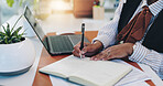Writing, laptop and hands of business person for planning, progress report and schedule manager. Research, notebook records and budget proposal with employee in office for review and checklist