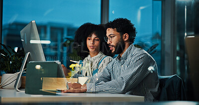 Buy stock photo Colleagues, team and collaboration with computer at night, office or journalist with article on web. Reading, research and people with tech for story, creative or working late for project in newsroom