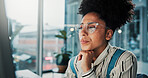 Computer, reading and thinking with business woman in office for update or review of information. Email, glasses and internet with employee in workplace for networking, online planning or vision