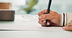 Hand, notebook and writing with business person at desk in office for checklist, memo or reminder. Calendar, pen or schedule and employee at work for planning agenda with diary or journal entry
