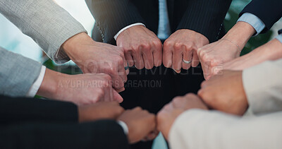 Buy stock photo Fist bump, circle and hands of business people in office for solidarity, unity or partnership. Teamwork, collaboration and group of corporate employees with support, synergy or motivation for goal.
