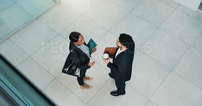 Buy stock photo Above, lobby and business man and woman for meeting, collaboration and finance review in office. Professional, corporate and workers in discussion for online proposal, budget report and feedback