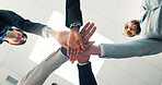 Team building, low angle and business people pile hands for support, target and connection. Stack, below and group of employees together in circle for cooperation, motivation and mission in office
