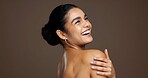Laughing, woman and skincare for bodycare, glow and smooth skin with cosmetics, thinking and mockup. Studio background, happy and person with smile for dermatology, space and treatment for beauty
