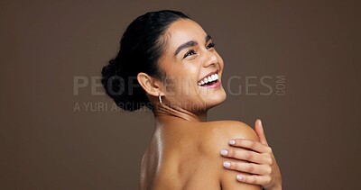 Buy stock photo Laughing, woman and skincare for bodycare, glow and smooth skin with cosmetics, thinking and mockup. Studio background, happy and person with smile for dermatology, space and treatment for beauty