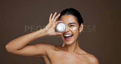 Buy stock photo Beauty, skincare portrait or girl with face cream for anti aging treatment, hydration or self care. Mockup, woman and excited with moisturizer product on studio background for skin benefits and glow
