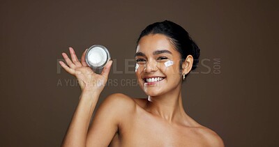 Buy stock photo Beauty, skincare portrait and woman with face cream for anti aging treatment, hydration and routine. Space, person and happy with moisturizer product on studio background for skin glow and self care