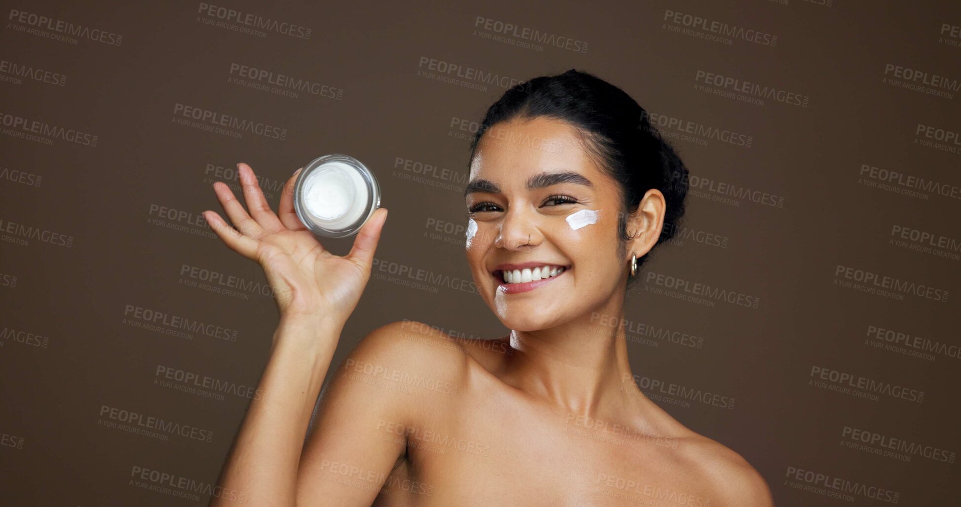 Buy stock photo Beauty, skincare portrait and woman with face cream for anti aging treatment, hydration and routine. Space, person and happy with moisturizer product on studio background for skin glow and self care