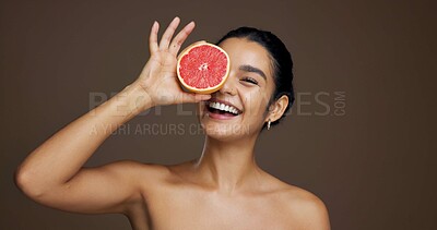 Buy stock photo Skincare, face and woman with grapefruit, smile and facial treatment with vitamin c for smooth skin. Studio background, mockup or person with cosmetic for hydration, dermatology or self care for glow