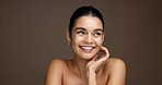 Thinking, woman and happy with skincare, glow and cosmetics for smooth skin, shine and mockup space. Studio background, reflection and person with smile for beauty, dermatology and facial treatment