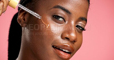 Buy stock photo Portrait, beauty and black woman with serum, skincare and facial treatment for healthy skin or glow. Studio background, oil and person with cosmetics for shine, anti aging and wellness for face