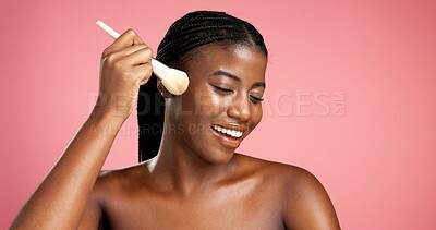 Buy stock photo Black woman, makeup and brush in studio background for beauty, makeover and glamour shine. Happy, female person and cosmetic tools for transformation, apply foundation and glow of aesthetics benefits