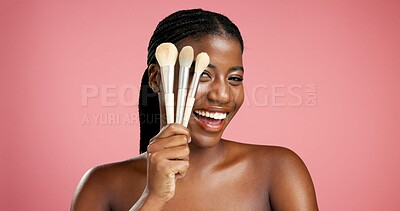 Buy stock photo Portrait, black woman and makeup brushes in studio background for beauty, makeover and glamour. Space, female person and cosmetic tools for transformation, foundation application and glow results