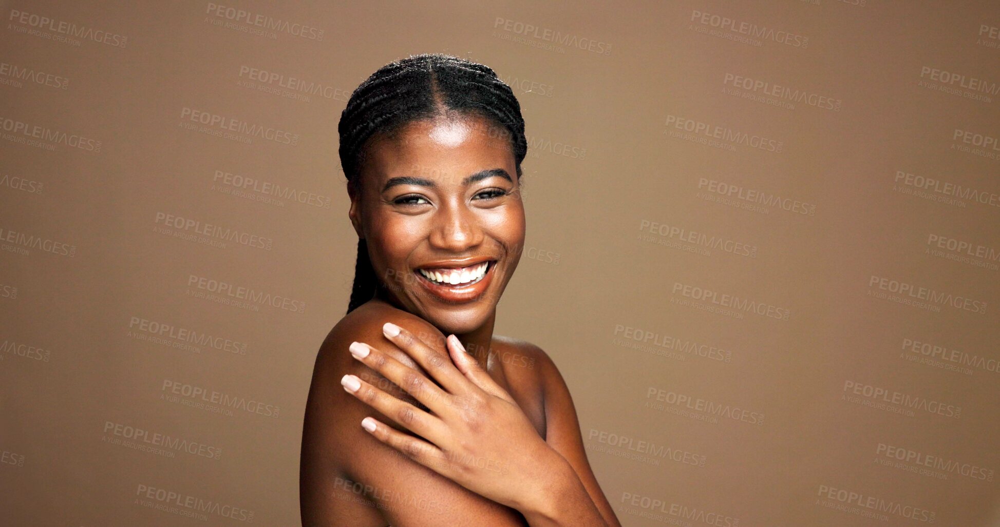 Buy stock photo Shoulder, beauty and smile with portrait of woman in studio for body care, shine or skincare. Glow, dermatology and hydration with female person on brown background for aesthetic, space and happiness