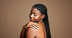 Studio background, shine and woman with smooth skin, treatment and smile for glow and mock up space. Happy, black person and pride for dermatology, beauty and cosmetics for wellness or skincare
