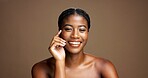 Confidence, happy or black woman is portrait with beauty, satisfaction or healthy glow. Studio, smile or proud African person isolated on brown background with wellness, skincare space or cosmetics