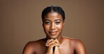 Portrait, woman and smile for skincare in studio background with beauty, facial treatment and results. Female person, hands together and natural cosmetics for shine, dermatology benefits and wellness