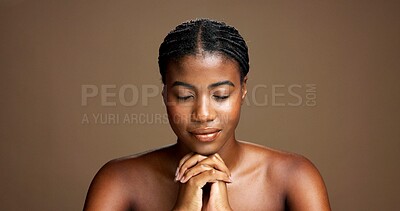 Buy stock photo African woman, beauty and skincare in studio background for change, facial treatment and results. Female person, hands together and natural cosmetics for shine, dermatology benefits and wellness goal
