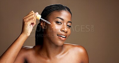 Buy stock photo Serum, skincare and portrait of black woman in studio for beauty product, cosmetics and dermatology. Glow, hyaluronic acid and self care with person and dropper on brown background space for retinol