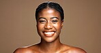Portrait, black woman and smile for skincare in studio with beauty, facial treatment and results. Happy, female person and natural cosmetics of dermatology, healthy shine and glow on brown background