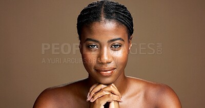 Buy stock photo Portrait, African woman and skincare in studio background for beauty, facial treatment and results. Female person, hands together and natural cosmetics for shine, dermatology benefits and wellness
